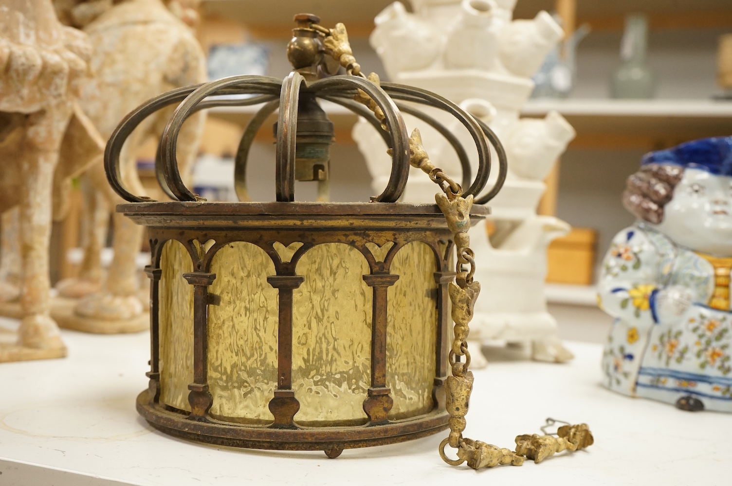 A brass and glass hanging ‘crown’ ceiling pendant, 20cm diameter
